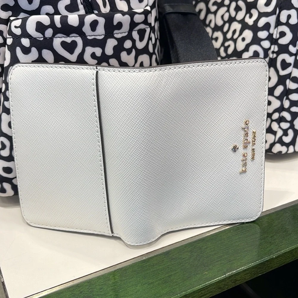 Kate Spade Madison Small Bifold Wallet
Meringue 
NWT - Picture 9 of 16